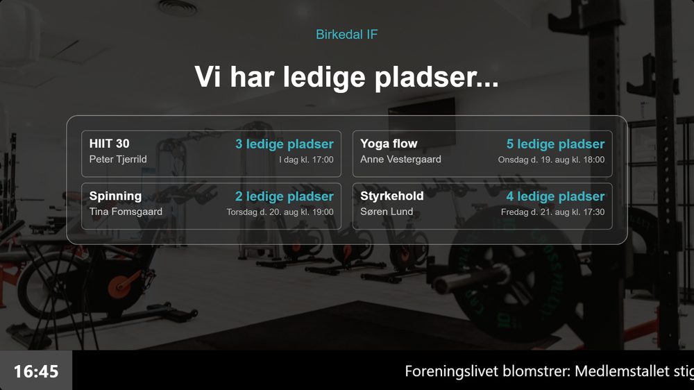Infoskærm-slide med ledige pladser hentet automatisk fra goMember