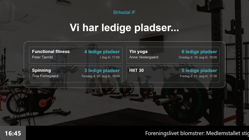 Infoskærm-slide med ledige pladser hentet automatisk fra Wondr